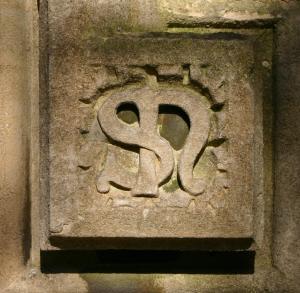 St Nicolas church logo in stonework